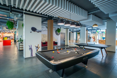 lounge/ community room with pool and ping pong tables