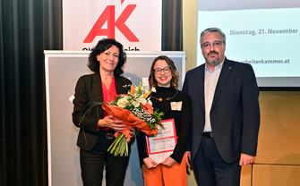 Photo of award ceremony with Iryna Sauca