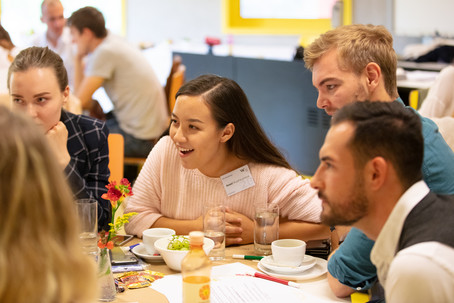 The Marketing Master students engaging in their discussions at the World-Café.