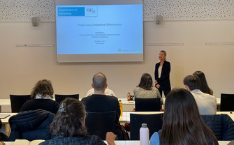 Kelly D Martin in front of class