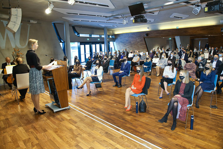 A representative of the alumi is giving a speech - second group