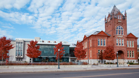 In this picture, we see campus building of Queen's University.