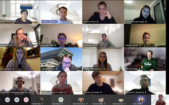 A virtual meeting with portrait photos of 16 participants