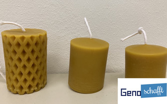 Anzeigebild_Bienenwachskerzen mit Geno schafft-Logo