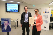 Prof. Alexander Rust und Monique Malan (PhD) bei der Preisübergabe