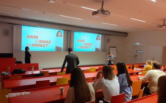Monika Koller and Melanie Peter from Henkel speak to the students in the auditorium