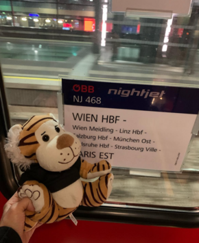 WU mascot (tiger) inside nightjet