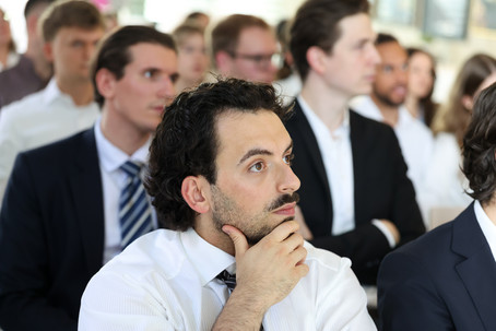 [Translate to English:] Philipp listening with great interest