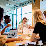 [Translate to English:] Foto von einem Meeting