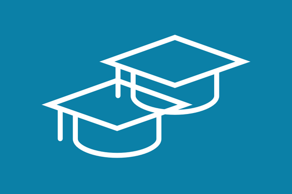 Two graduation caps icon