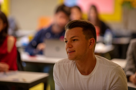 Students of the class of 2020 voting for the best master thesis