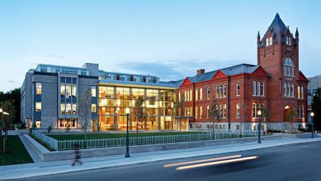 In this picture, we see campus building of Queen's University.