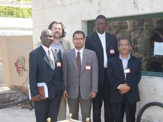 A group of speakers at the International Conference on Cooperative Social, Economic and Cultural Capabilities